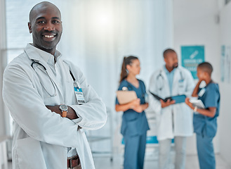 Image showing Happy, doctor and portrait of black man with crossed arms for medical help, insurance and trust. Healthcare, hospital team and face of professional male health worker for service, consulting and care