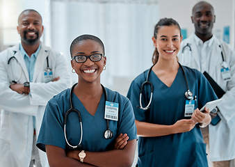 Image showing Teamwork, doctors and portrait of black woman with crossed arms for medical help, insurance and trust. Healthcare, hospital team and happy men and women health worker for service, consulting and care
