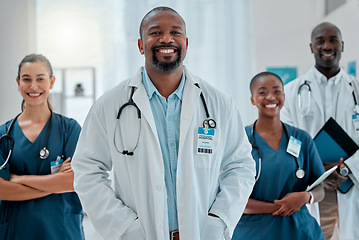 Image showing Teamwork, happy and portrait of doctors in hospital for medical help, insurance and service. Healthcare, collaboration and men and women health workers smile in clinic for help, consulting and care