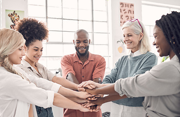 Image showing Team work, hands of business people together with smile, goals and collaboration at start up agency. Happy team, motivation and hand stack with huddle, employees working with cooperation in office