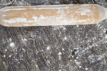 Image showing white wheat flour on a wooden table