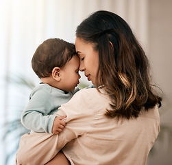 Image showing Face, hug and mother with baby in a living room with love, care and gratitude while bonding in their home. Calm, parent and mom with toddler girl embrace sweet and relax, loving and enjoy motherhood