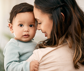 Image showing Love, portrait and mother with baby, smile and playing during morning bonding routine in their home together. Family, face and mom with girl toddler in living room having fun, embrace and relax