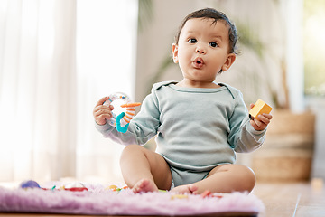 Image showing Portrait, wow and surprised baby with toys on floor for fun, playing and game at home. Face, shock and toddler boy with creative building blocks for child development, learning or play in living room