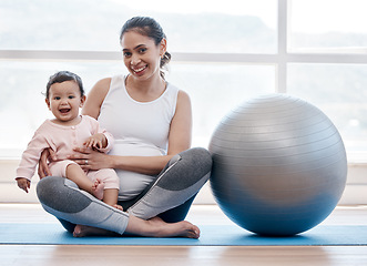 Image showing Mom, baby and floor in portrait by exercise ball, laughing and bonding together for fitness, health and wellness. Workout, pregnant mother and newborn with happiness, home and excited face for yoga