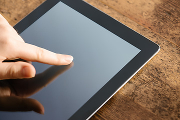 Image showing Hand, woman and typing on tablet, screen and technology for working online in a cafe with app, network or social media. Hands, touchscreen and reading news, blog or search on internet website