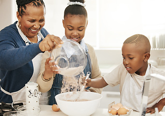 Image showing Black family, grandma teaching kids baking and learning baker skill in kitchen with help and support. Old woman with girl and boy are happy, development with growth and bake with ingredients at home