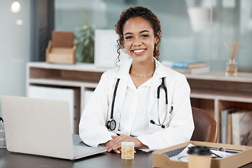 Image showing Doctor, woman in portrait and smile, healthcare and medical professional in office with stethoscope and laptop. Female person in medicine, desk and health insurance with cardiologist at hospital