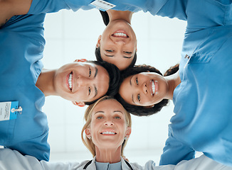 Image showing Diversity, teamwork or faces of nurses in huddle with a happy smile collaboration for healthcare goals. Trust, team building or low angle of medical doctors with group support, motivation or mission