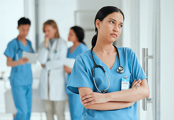 Image showing Woman thinking, stress or sad nurse with burnout, anxiety or problem worried by medical emergency. Worry, tired woman or depressed healthcare doctor with grief, fear or depression in hospital clinic