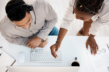 Image showing Call center, top view and training with business people and computer for coaching, customer service or communication. Help desk, contact us and mentor with man and black woman for teamwork from above