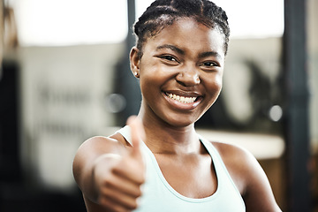 Image showing Thank you, portrait of black woman with thumbs up and at gym happy for workout. Success or achievement, support or smile and African female athlete with emoji hand for motivation or fitness.