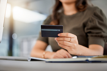 Image showing Hand, credit card and office with e commerce, computer and payment for discount, sale and cybersecurity. Girl, online shopping and banking with fintech, budget or financial decision with workplace pc