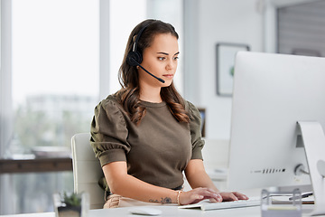 Image showing Virtual assistant, computer or woman typing in call center consulting online at customer services help desk. Research, crm agent or girl consultant in telemarketing or telecom sales company in office