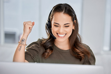 Image showing Happy, success or excited consultant in call center on target for winning a telemarketing or telecom bonus. Computer, winner or happy virtual assistant with a smile for victory or goals achievements