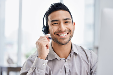 Image showing Indian man, call center and portrait of working at office desk, computer or job in telemarketing, communication or sales. Agent, happy employee or work in consulting, customer service or crm business