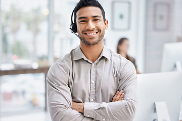 Image showing Portrait, customer service and support with a man consultant in his telemarketing office for assistance. Call center, contact us and consulting with a male employee using a headset for retail crm