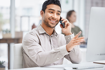 Image showing Customer service, man call center agent on smartphone and with computer at his desk in a modern office workplace. Telemarketing, online communication and male person help customer on a phone call