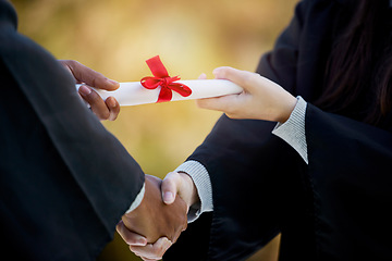 Image showing Handshake, graduation diploma and people in success, achievement and congratulations or thank you. Graduate, student or person shaking hands for certificate, excellence and giving award at University