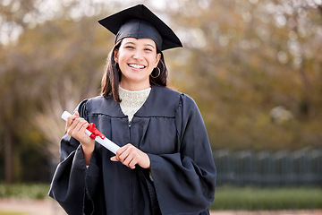 Image showing Woman, graduation and college diploma in portrait, outdoor and success with pride, achievement and life goal. Graduate girl, certificate and happy student at university event, celebration and excited