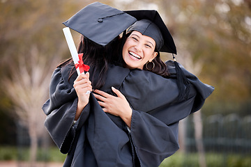 Image showing Woman friends, congratulations hug and graduation at college, campus and celebration with diploma. University students, graduate event and certificate for success, achievement and excited in embrace