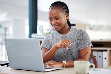 Image showing Laptop, focus and business with black woman in office for research, website and designer. Thinking, creative and internet with female employee in digital agency for technology, email and entrepreneur