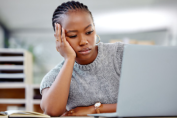 Image showing Mental health, businesswoman with a headache and laptop at her desk in a modern office workplace. Depression or sad, anxiety or tired and female person with a problem or mistake at her workstation