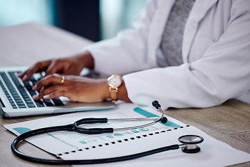 Image showing Closeup, hands and doctor with a laptop, stethoscope and typing with connection, documents and telehealth. Black woman, female person or employee with a folder, medical equipment and digital planning