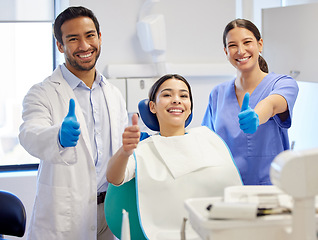 Image showing Dentist team, patient and thumbs up portrait for.consultation, clean or teeth whitening. Woman, asian man or healthcare staff and client together for dental care, oral health exam and mouth cleaning