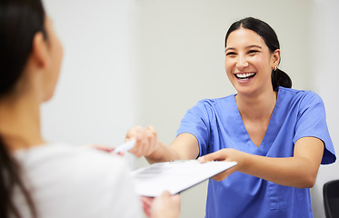 Image showing Documents, happy and a nurse helping a patient in the hospital during an appointment or checkup. Insurance form, smile and a medical assistant at a health clinic to help with check in or sign up