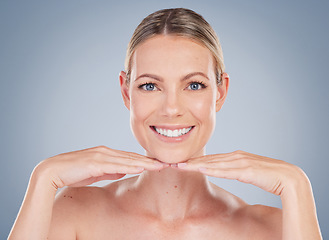 Image showing Beauty, skincare and happy with portrait of woman in studio for facial, cosmetics and natural makeup. Self care, wellness and mockup with face of model on grey background for glow, smile and collagen