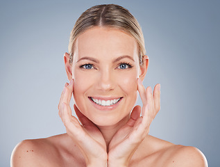 Image showing Happy, skincare and portrait of woman in studio for facial, cosmetics and natural makeup. Self care, wellness and mockup with face of female model on grey background for glow, happiness and collagen