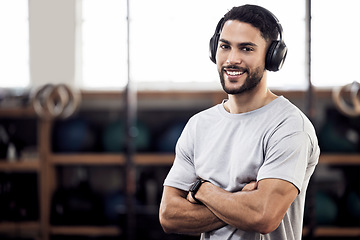 Image showing Headphones, fitness and man listening to music at gym for exercise or training workout. Face portrait of happy male athlete listen to audio sound with tech for motivation, mindset and space to relax