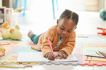 Image showing Black girl, floor and learning with art education, drawing and color to relax, happiness and writing. Female kid, toddler and young person on the ground, home and child development with happiness