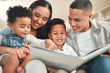 Image showing Young happy family, children reading and couch for story, book and learning together in home, love and bonding. Parents, education and kids on living room sofa with smile, care and support in house