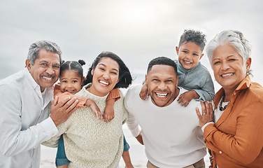 Image showing Happy family, smile portrait and beach with grandparents, parent love and kids together by sea. Outdoor, vacation and children with grandmother and father by the ocean on holiday in group with travel