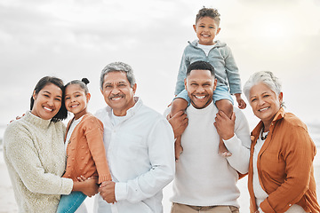 Image showing Happy family, outdoor portrait and beach with grand parents, parent love and kids together by sea. Fun, vacation and children with grandmother and father by ocean on holiday with people and smile