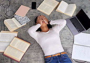 Image showing Study anxiety, fatigue and woman student on ground with textbook for test feeling overworked. Stress, female person and home studying for university exam and course with laptop for elearning online