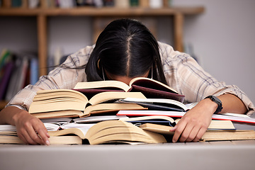 Image showing Study books, fatigue and woman student at desk with textbook for test feeling overworked. Stress, female person and home studying for university exam and course with burnout and sleeping in a house