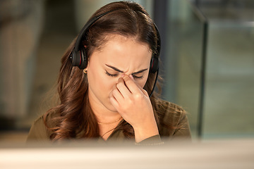 Image showing Stress, call center and woman with a headache, telemarketing and overworked with burnout. Female person, consultant and agent with a migraine, anxiety and customer service with crm and tech support