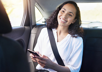 Image showing Smile, woman in backseat of taxi and phone for typing on mobile app for transport or gps location search. Travel service, commute and happy passenger in cab with cellphone for destination tracking.