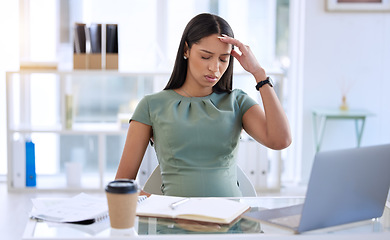 Image showing Pregnant woman in office, stress headache at desk with laptop and small business research online. Pregnancy, fatigue and exhausted businesswoman working overtime on report at startup design company.