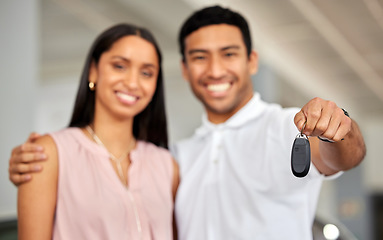 Image showing Couple at car dealership, choice and key in hand with transportation, buying new vehicle with luxury and smile. Happy with decision, man and woman at automobile showroom with purchase and cars