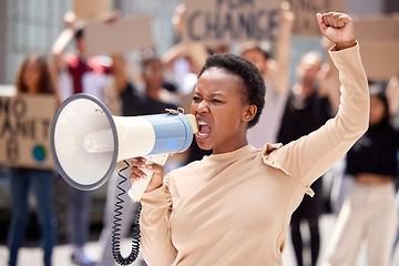 Image showing Equality, protest and black woman leader with megaphone and shouting loud for justice due to government problem. Justice, angry and person fist up for politics fight or freedom with frustrated group