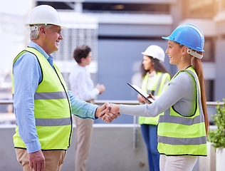 Image showing Construction people, handshake and business deal of architect management on a job site. Engineering team, shaking hands and staff with agreement, achievement and surveyor contract with happiness