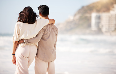 Image showing Couple hug on beach, ocean and back view with trust, travel and vacation in Mexico with love and bonding outdoor. Mockup space, summer and people together in nature with relationship and commitment