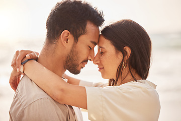 Image showing Couple, forehead touch and hug with love and travel, sun and sea with care on vacation in Mexico. Commitment, support and trust in relationship, tourism and people embrace with peace and affection