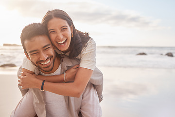 Image showing Couple, portrait and hug at the beach with happiness on vacation for love with sunshine. Man, woman and hugs at the ocean with sun for a holiday with a smile for the weekend with a relaxing date.