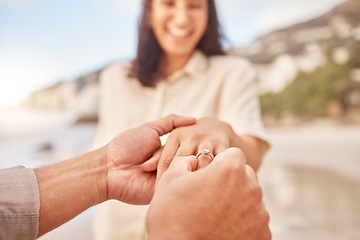 Image showing Pov, engagement and woman with ring on hand at beach with smile, love and happy couple vacation. Man, woman and jewelry with marriage offer by ocean with diamond, excited face or together on holiday