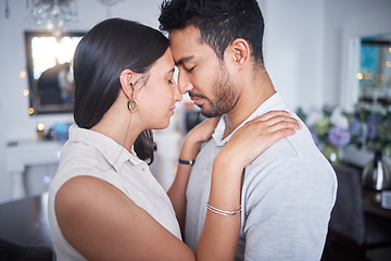 Image showing Touching, bonding and couple with forehead together in communication of support, love or trust in partnership. People, forgive and hug after fight, conflict or date for healthy relationship and peace